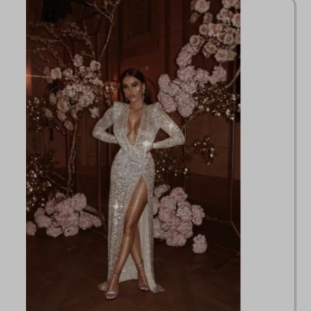 Long evening V neck Gown, Jessica Bara, silver sequence with slit,  size Med.